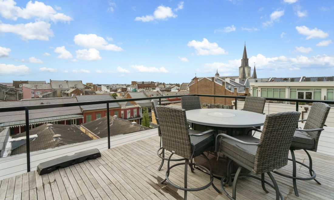 Upper deck table, cathedral spires beyond, 528 Wilkinson Street