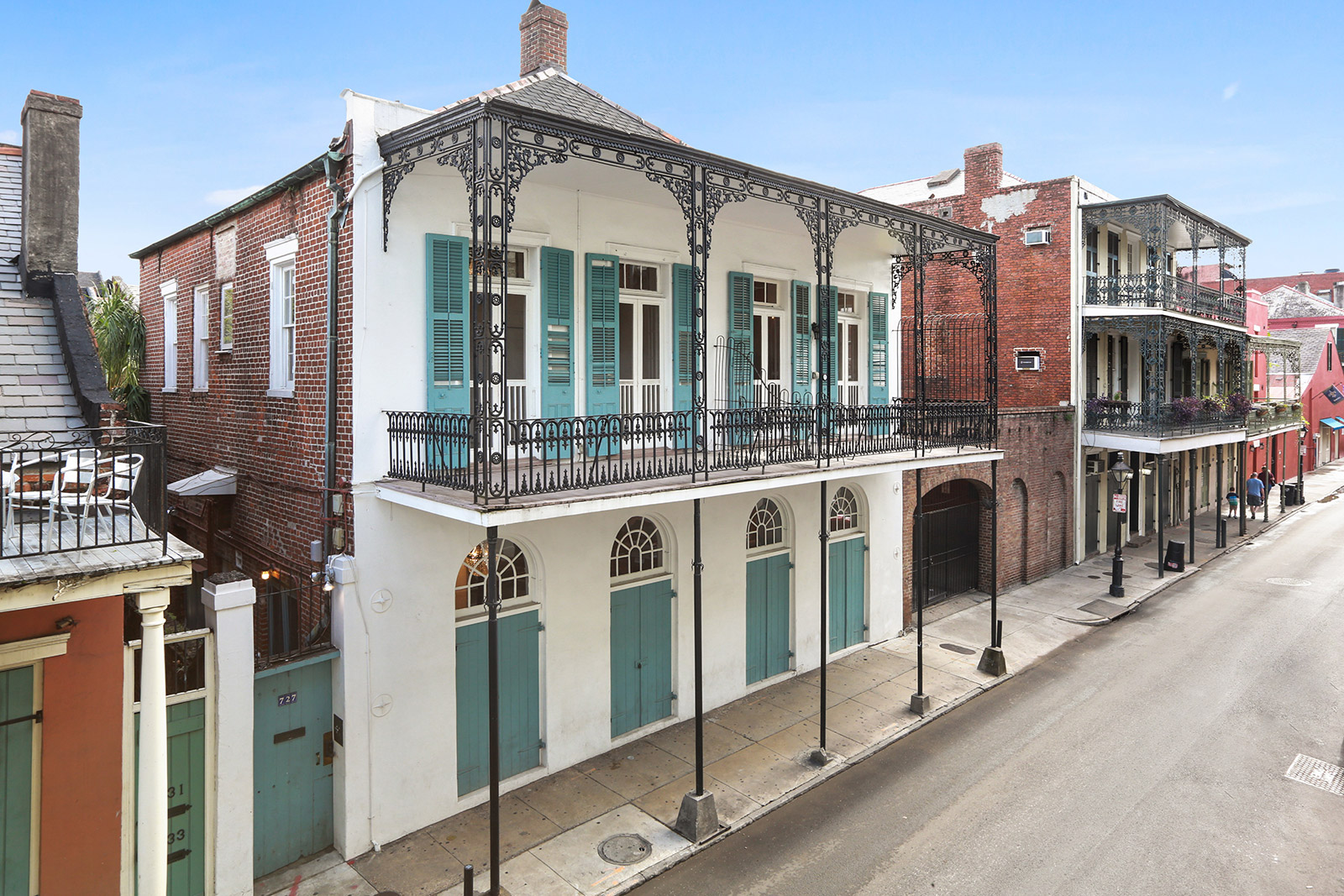 727 St Ann Street French Quarter teal shutters ornate wrought-iron balcony — sold by Patrick Knudsen